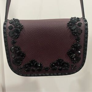 Kate Spade Plum Crossbody Bag with Black Embellishments